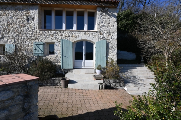 Magnificent stone property with pool and land