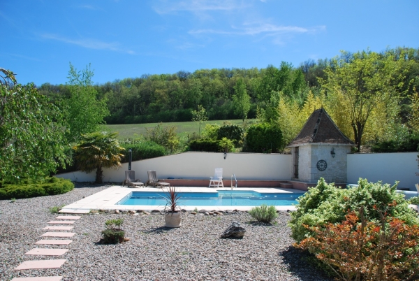 In an idyllic setting, old restored house with swimming pool and 17ha of land