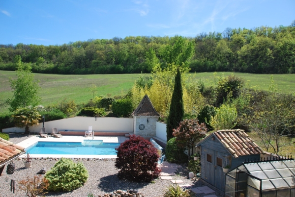 In an idyllic setting, old restored house with swimming pool and 17ha of land