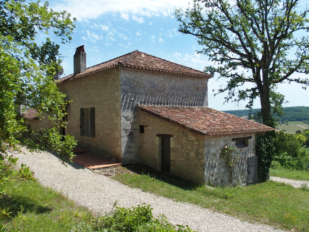 Tastefully renovated stone house, with barn and superb view